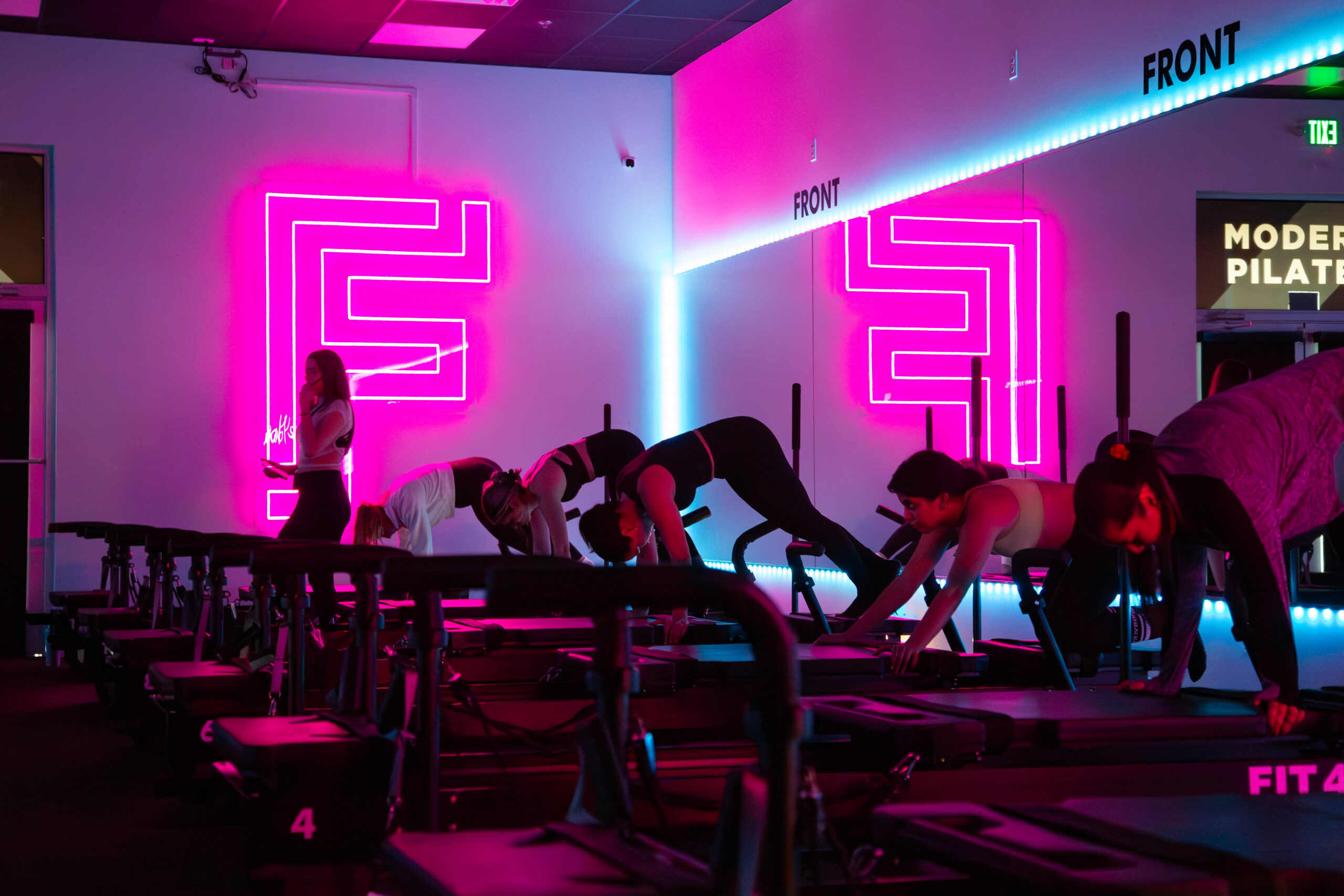 Girls doing pilates in FIT studio