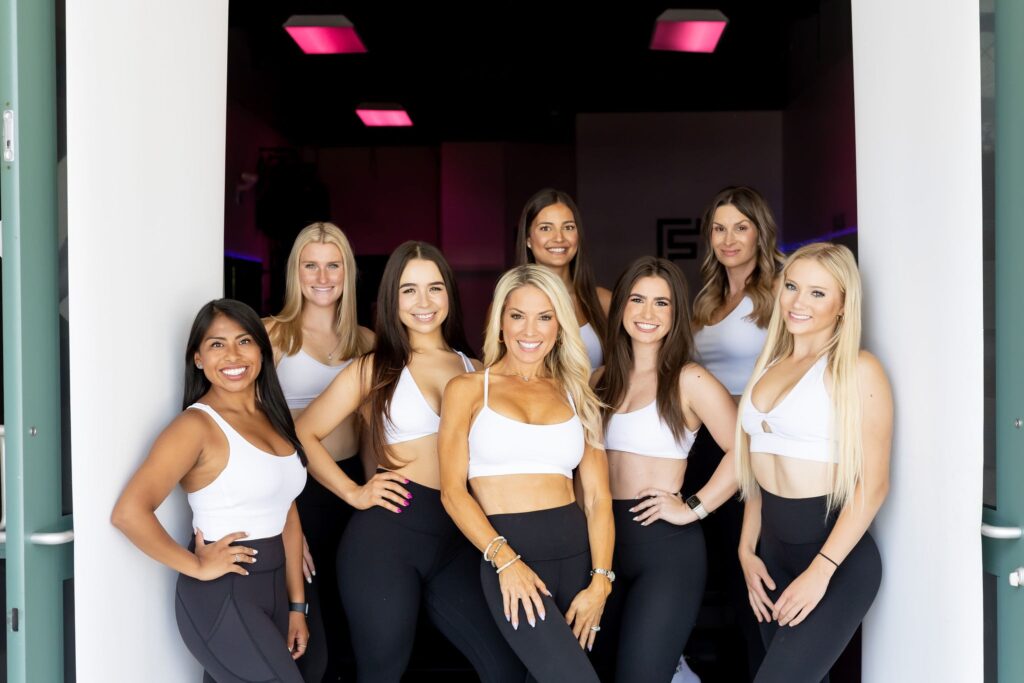 FIT 407 trainers greeting you before beginners pilates class